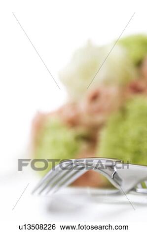 Stock Photograph - Fork and a bouquet. Fotosearch