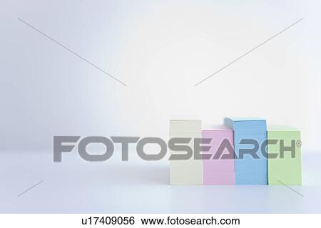 Four stacks of colored adhesive notes View Large Photo Image Stock Photograph - Four stacks of colored adhesive notes. Fotosearch