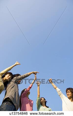 Friends playing rock paper scissors View Large Photo Image Stock Photograph - Friends playing rock paper scissors. Fotosearch