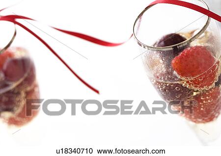 Fruit champagne cocktail View Large Photo Image Stock Image - Fruit champagne cocktail. Fotosearch