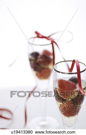 Fruit champagne cocktail View Large Photo Image Stock Image - Fruit champagne cocktail. Fotosearch