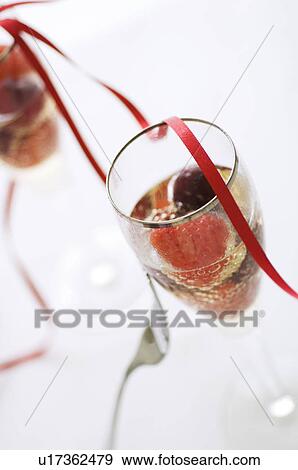 Stock Photo - Fruit champagne cocktail. Fotosearch