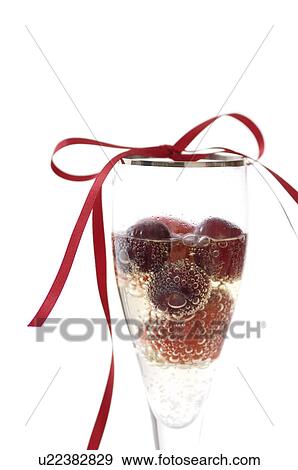 Fruit champagne cocktail View Large Photo Image Stock Photo - Fruit champagne cocktail. Fotosearch