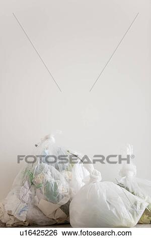 Garbage in plastic bags View Large Photo Image Stock Photograph - Garbage in plastic bags. Fotosearch