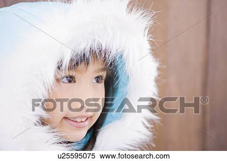 Stock Photography - Girl wearing a hooded jacket. Fotosearch