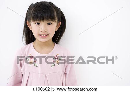 Girl wearing pink dress View Large Photo Image Stock Photography - Girl wearing pink dress. Fotosearch