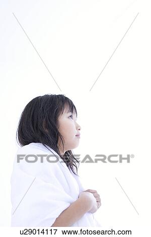 Stock Photo - Girl with a towel around her neck. Fotosearch