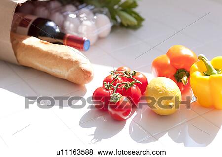 Groceries in an paper bag View Large Photo Image Stock Photo - Groceries in an paper bag. Fotosearch