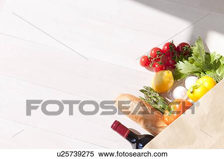 Stock Photography - Groceries in an paper bag. Fotosearch