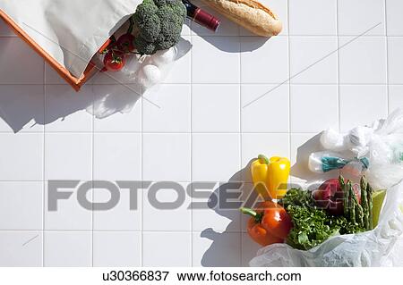 Groceries in bags View Large Photo Image Stock Photo - Groceries in bags. Fotosearch