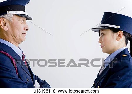 Guards standing face to face View Large Photo Image Stock Photo - Guards standing face to face. Fotosearch
