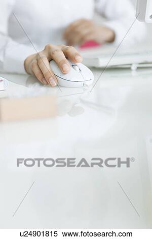 Stock Photography - Hand using computer mouse. Fotosearch
