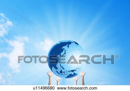 Hands holding up a globe View Large Photo Image Stock Image - Hands holding up a globe. Fotosearch