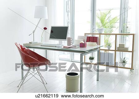 Stock Photo - Home office with bookshelf. Fotosearch
