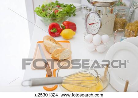 Picture - Ingredients on kitchen counter. Fotosearch