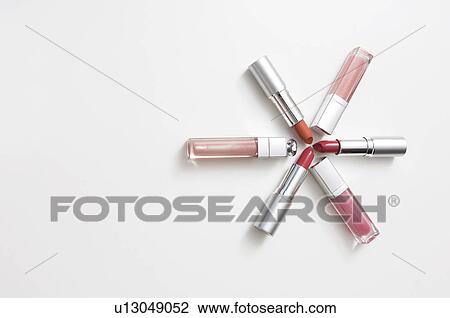 Stock Image - Lipsticks and lipglosses. Fotosearch