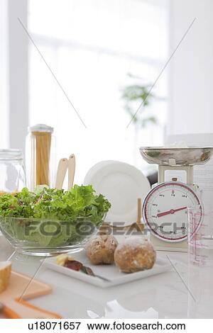 Meal being prepared on kitchen bench View Large Photo Image Stock Photo - Meal being prepared on kitchen bench. Fotosearch