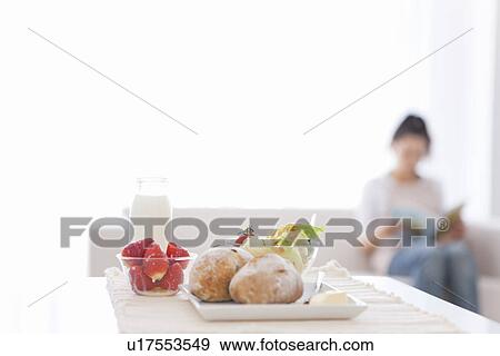 Meal of salad, strawberries and bread rolls with milk View Large Photo Image Stock Photo - Meal of salad, strawberries and bread rolls with milk. Fotosearch