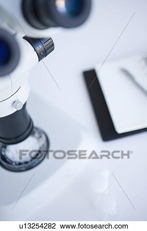 Stock Image - Microscope. Fotosearch