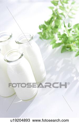 Stock Image - Milk bottles. Fotosearch