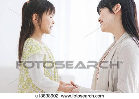 Mother and daughter holding hands View Large Photo Image Stock Image - Mother and daughter holding hands. Fotosearch