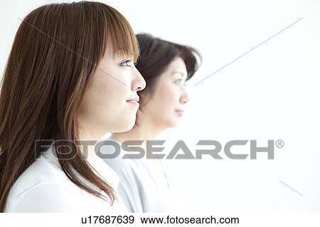 Mother and daughter in profile View Large Photo Image Stock Photo - Mother and daughter in profile. Fotosearch