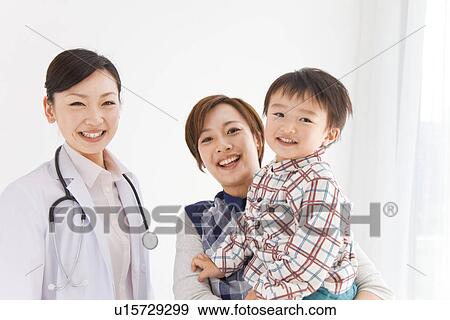 Mother and son with doctor View Large Photo Image Stock Photo - Mother and son with doctor. Fotosearch