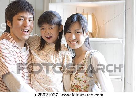 Mother, father and little girl View Large Photo Image Stock Photo - Mother, father and little girl. Fotosearch