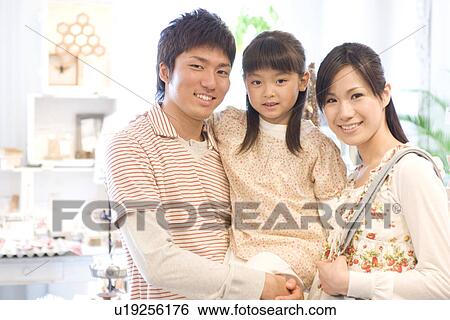 Mother, father and little girl View Large Photo Image Stock Photograph - Mother, father and little girl. Fotosearch