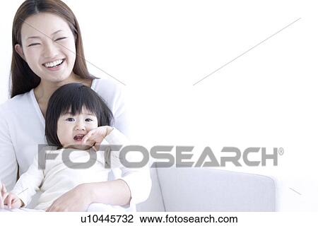 Mother holding one year old daughter View Large Photo Image Stock Image - Mother holding one year old daughter. Fotosearch