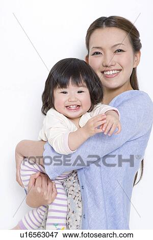 Mother with 1 year old daughter View Large Photo Image Stock Photo - Mother with 1 year old daughter. Fotosearch