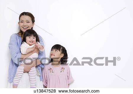Mother with two daughters View Large Photo Image Stock Photo - Mother with two daughters. Fotosearch