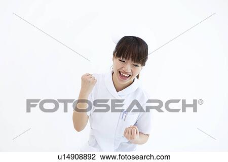 Nurse doing victory pose View Large Photo Image Stock Image - Nurse doing victory pose. Fotosearch