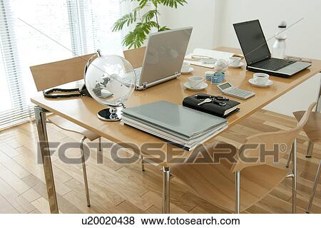 Stock Photo - Office with laptops on desk. Fotosearch