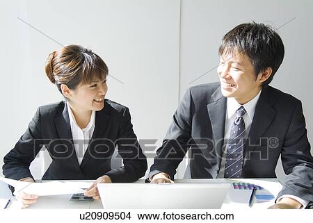 Office workers in a meeting View Large Photo Image Picture - Office workers in a meeting. Fotosearch