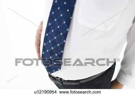 Picture - Overweight businessman with a pot belly. Fotosearch