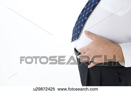 Overweight businessman with a pot belly View Large Photo Image Stock Photography - Overweight businessman with a pot belly. Fotosearch