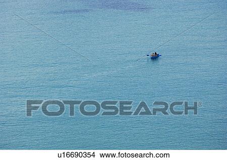 Picture - People kayaking at sea. Fotosearch