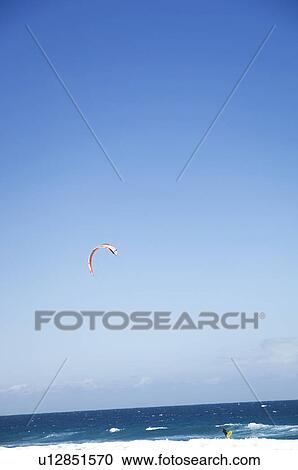 People kiteboarding at sea View Large Photo Image Stock Image - People kiteboarding at sea. Fotosearch