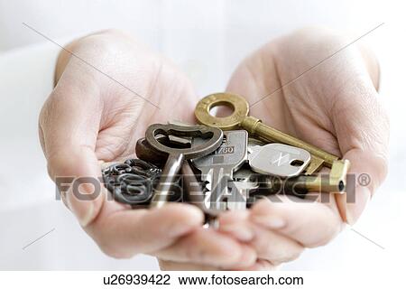 Person holding keys View Large Photo Image Stock Image - Person holding keys. Fotosearch