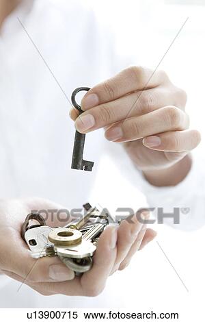 Person holding keys View Large Photo Image Stock Photography - Person holding keys. Fotosearch