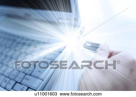 Person inserting USB stick into laptop with flare of light View Large Photo Image Stock Image - Person inserting USB stick into laptop with flare of light. Fotosearch