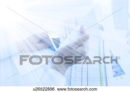 Stock Photograph - Person looking through documents. Fotosearch