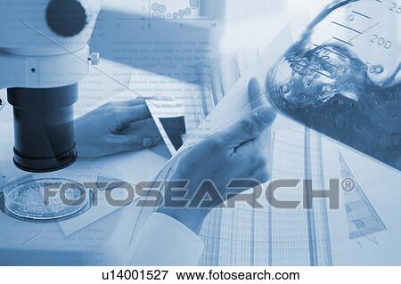 Person looking through documents with image of microscope and beaker View Large Photo Image Stock Photo - Person looking through documents with image of microscope and beaker. Fotosearch