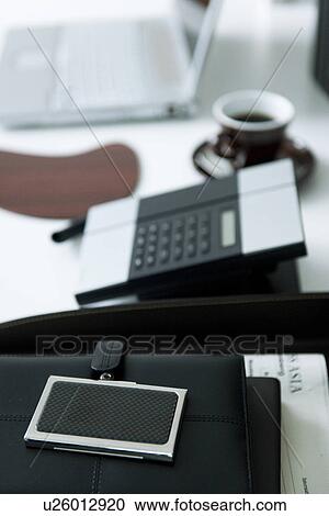 Stock Image - Personal organizer on office desk. Fotosearch