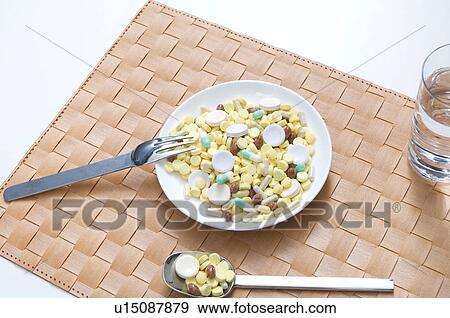 Pills in a bowl View Large Photo Image Stock Photo - Pills in a bowl. Fotosearch