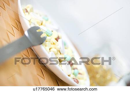 Pills in a bowl View Large Photo Image Stock Photograph - Pills in a bowl. Fotosearch