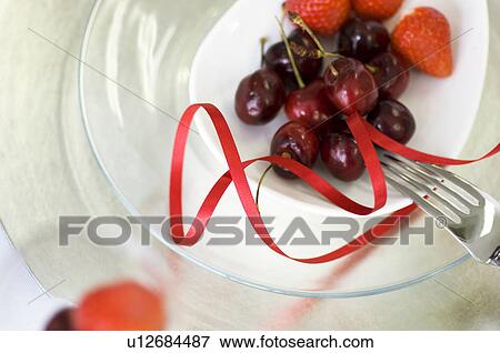 Stock Photo - Plate of fruit. Fotosearch