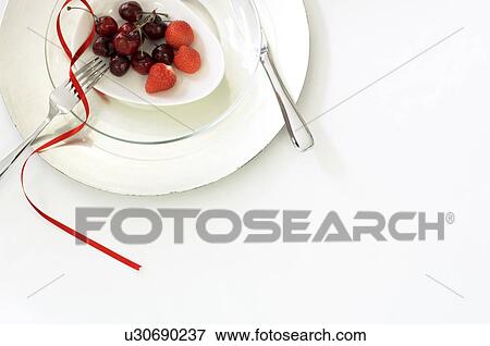 Stock Photo - Plate of fruit. Fotosearch