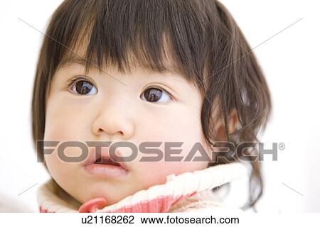 Stock Image - Portrait of 1 year old girl. Fotosearch